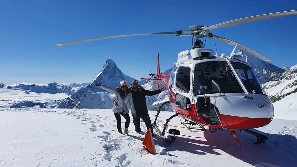 A private helicopter arrival in the Alps